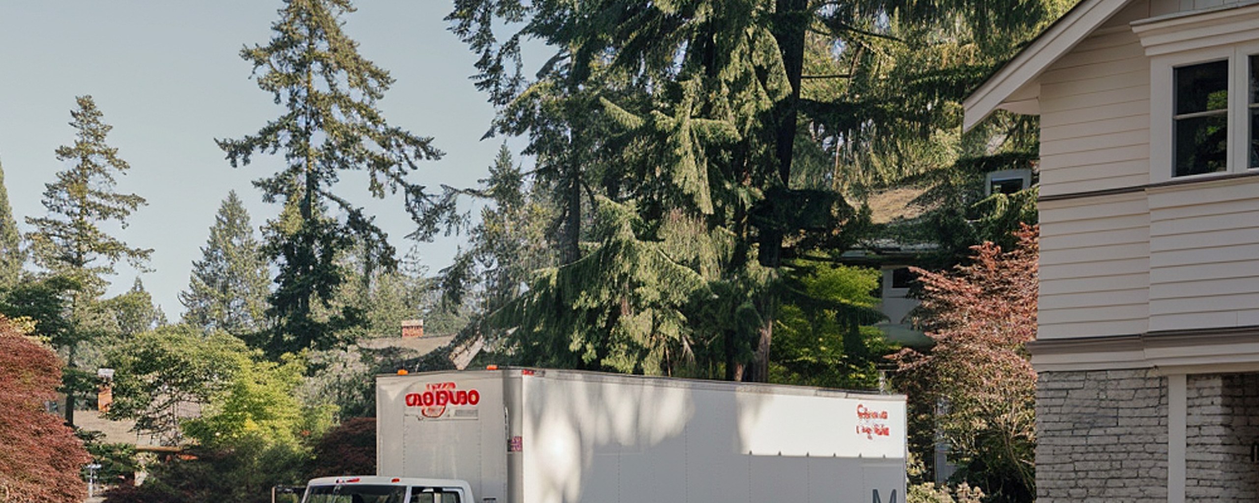 Moving truck and crew serving Dracut, Massachusetts
