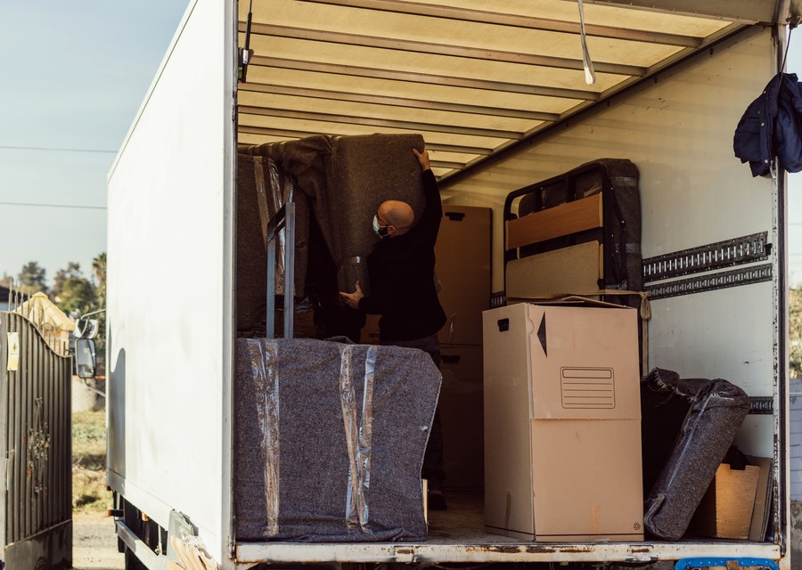 Movers loading a truck in Lake Charles, Louisiana