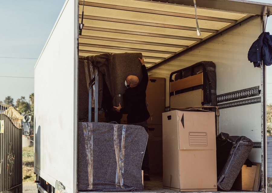 Movers loading a truck in Shreveport, Louisiana
