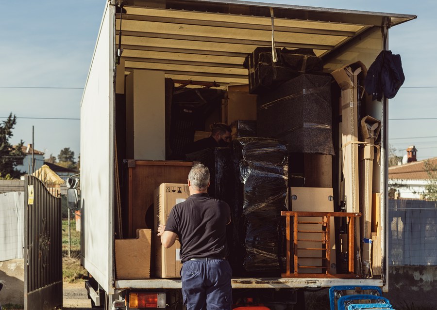 Movers loading a truck in Bernalillo, New Mexico