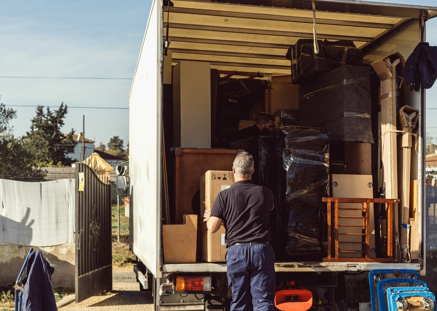Movers loading a truck in Highland Park, Texas