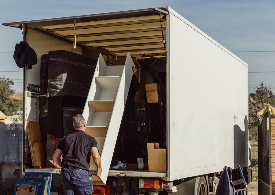 Movers loading a truck in Aurora, Colorado