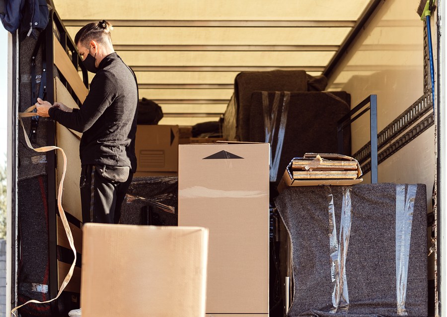 Movers loading a truck in Mobile, Alabama