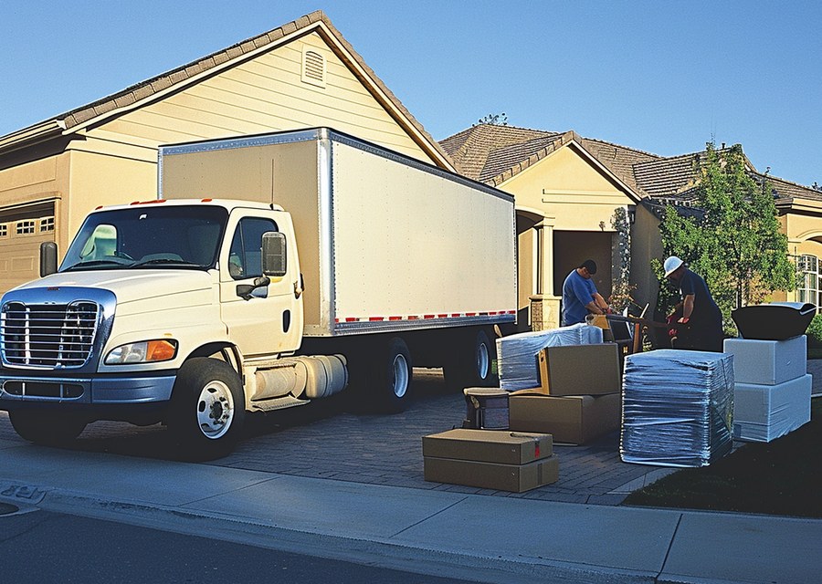 Movers loading a truck in Baton Rouge, Louisiana
