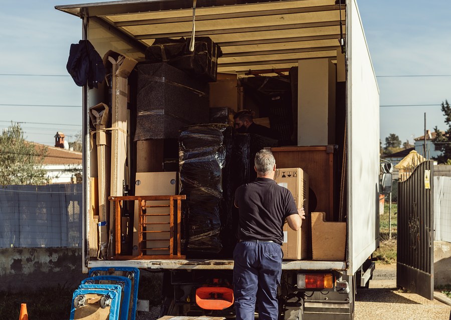 Movers loading a truck in Lake Charles, Louisiana