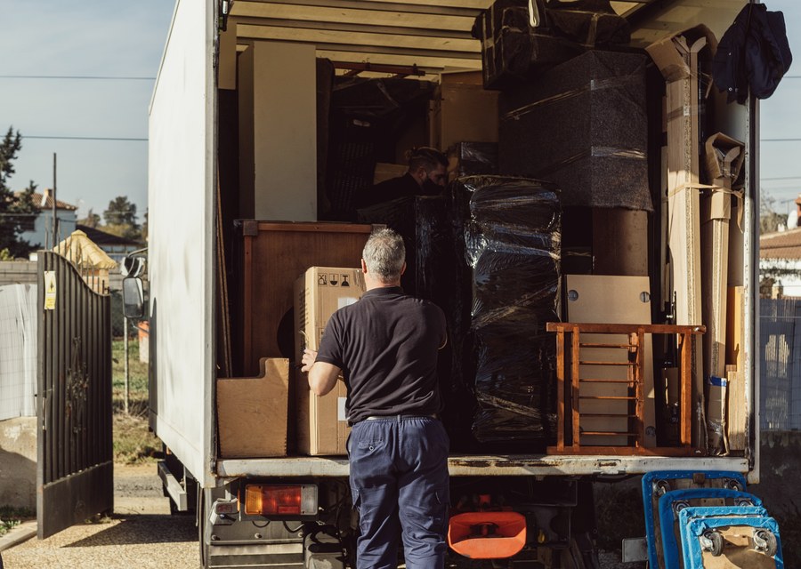 Movers loading a truck in Shreveport, Louisiana