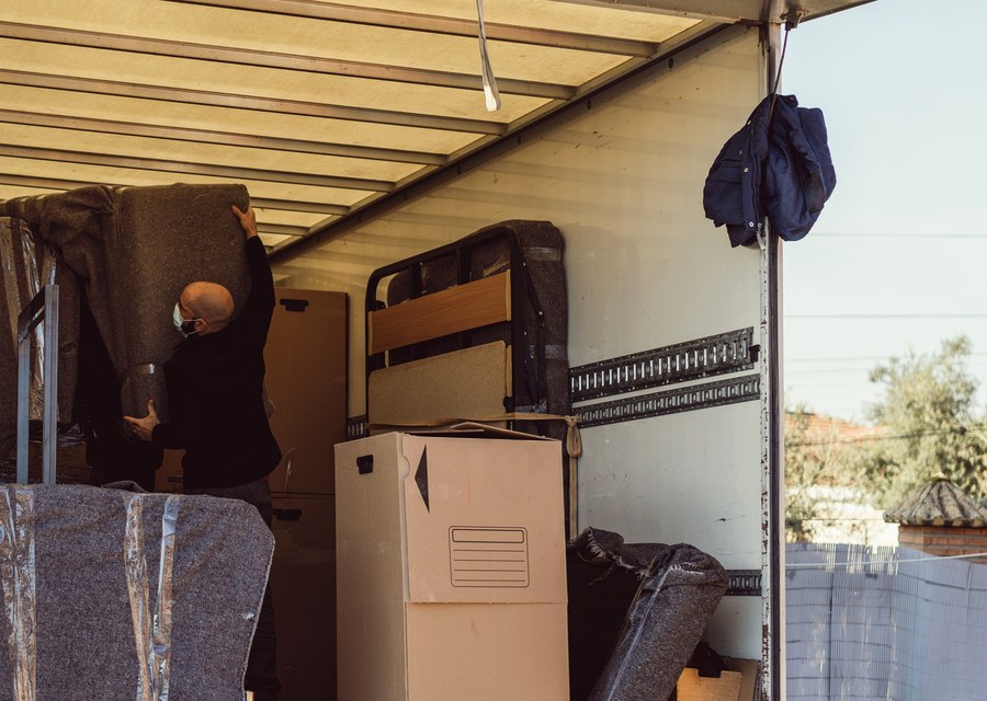 Movers loading a truck in Lake Charles, Louisiana