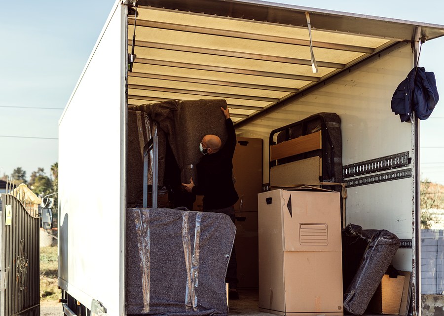 Movers loading a truck in Topeka, Kansas