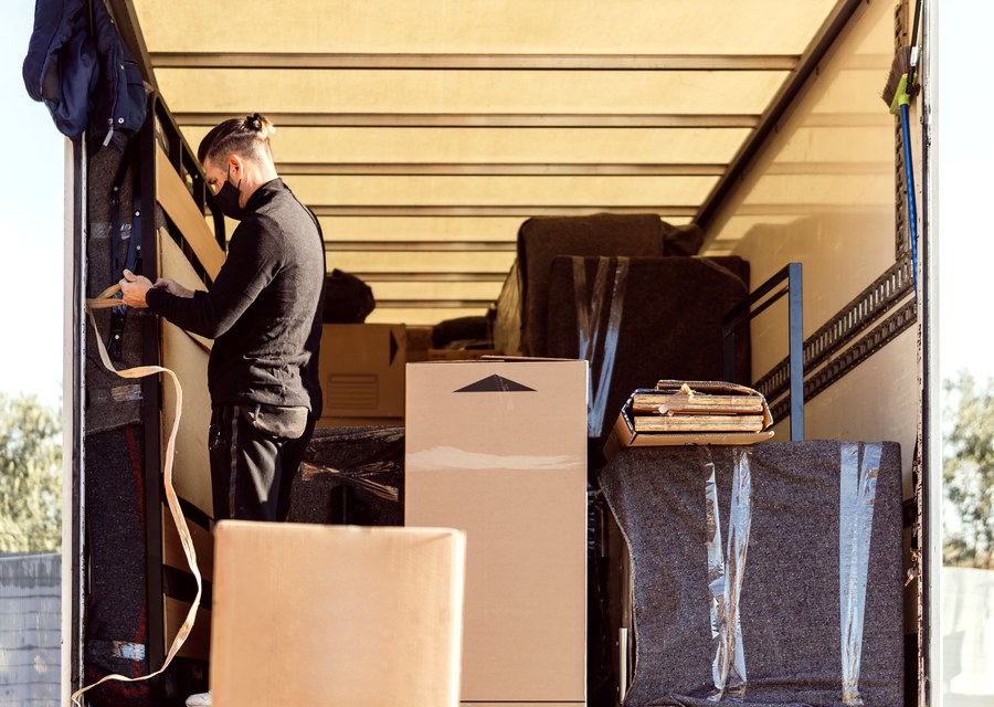 Movers loading a truck in Fayetteville, Arkansas