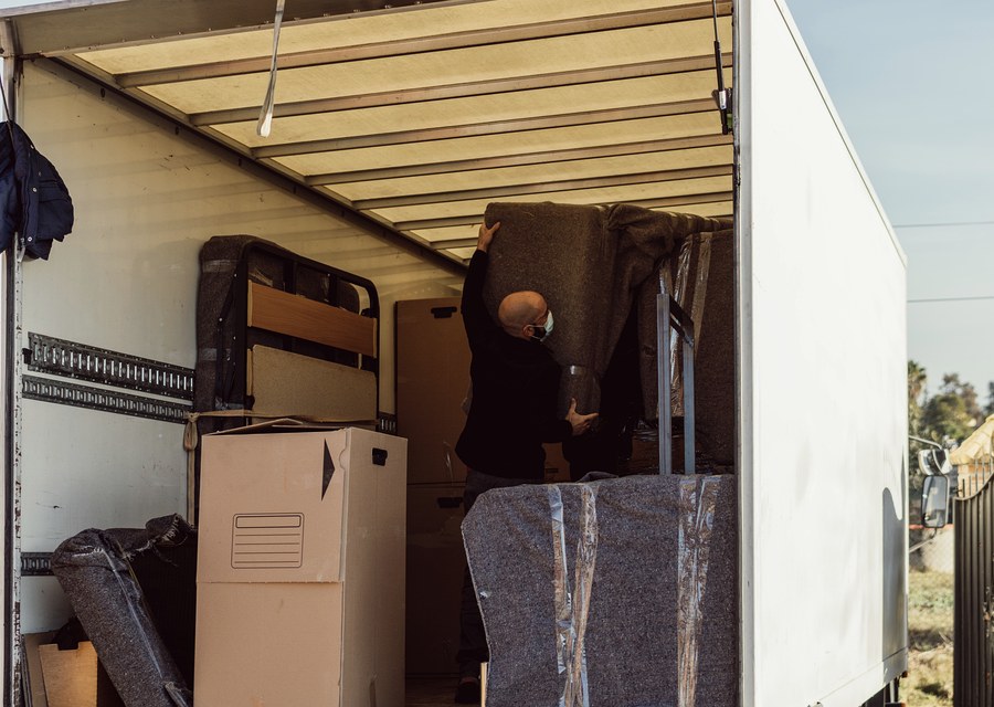 Movers loading a truck in Corrales, New Mexico